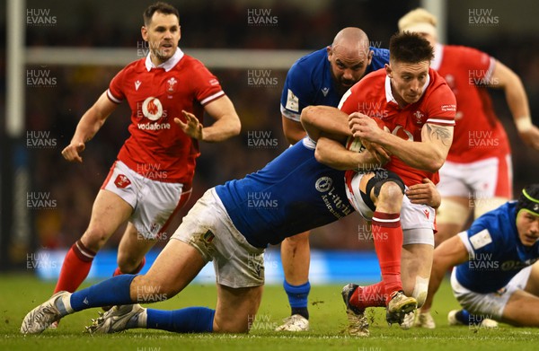 160324 - Wales v Italy - Guinness Six Nations - Josh Adams of Wales  is tackled by Danilo Fischetti of Italy 