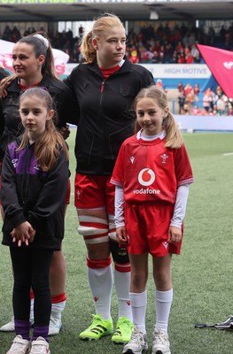 170526 - Wales v Italy, 2026 Guinness Women’s 6 Nations - Bethan Lewis of Wales with match mascot