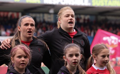 170526 - Wales v Italy, 2026 Guinness Women’s 6 Nations - Kayleigh Powell of Wales and Bethan Lewis of Wales during the anthems