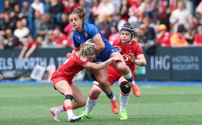 170526 - Wales v Italy, 2026 Guinness Women’s 6 Nations - Keira Bevan of Wales tackles Sara Mannini of Italy