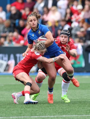 170526 - Wales v Italy, 2026 Guinness Women’s 6 Nations - Keira Bevan of Wales tackles Sara Mannini of Italy