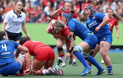 170526 - Wales v Italy, 2026 Guinness Women’s 6 Nations - Keira Bevan of Wales is tackled by Elisa Giordano of Italy