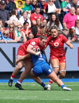 170526 - Wales v Italy, 2026 Guinness Women’s 6 Nations - Gwenllian Pyrs of Wales is tackled by Alissa Ranuccini of Italy