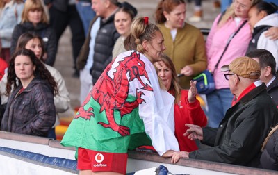 170526 - Wales v Italy, 2026 Guinness Women’s 6 Nations - Hannah Dallavalle of Wales with family at the end of the match