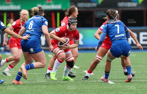 170526 - Wales v Italy, 2026 Guinness Women’s 6 Nations - Bethan Lewis of Wales takes on Alissa Ranuccini of Italy and Francesca Sgorbini of Italy
