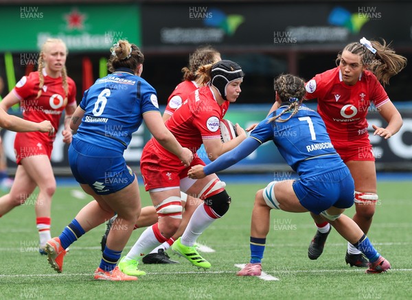 170526 - Wales v Italy, 2026 Guinness Women’s 6 Nations - Bethan Lewis of Wales takes on Alissa Ranuccini of Italy and Francesca Sgorbini of Italy