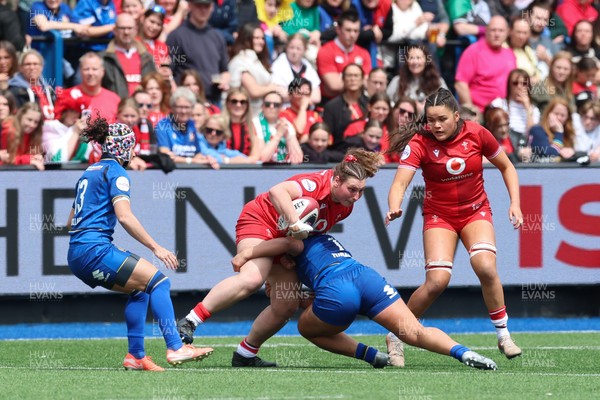 170526 - Wales v Italy, 2026 Guinness Women’s 6 Nations - Gwenllian Pyrs of Wales is tackled by Alissa Ranuccini of Italy