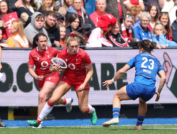 170526 - Wales v Italy, 2026 Guinness Women’s 6 Nations - Hannah Dallavalle of Wales takes on Aura Muzzo of Italy