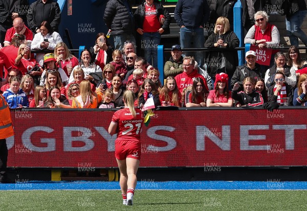 170526 - Wales v Italy, 2026 Guinness Women’s 6 Nations - Seren Lockwood of Wales goes to meet fans at the end of the match
