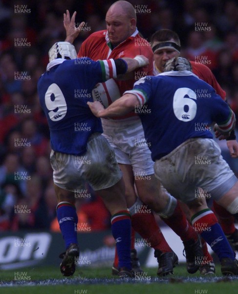 190200 - Wales v Italy - Six Nations -  Craig Quinnell of Wales is tackled by Alessandro Troncon