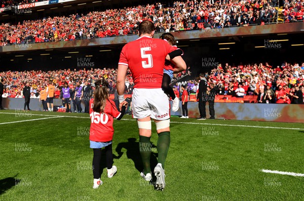 190322 - Wales v Italy - Guinness Six Nations - Alun Wyn Jones of Wales runs out with daughters Mali and Efa to win his 150th cap