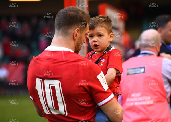190322 - Wales v Italy - Guinness Six Nations - Dan Biggar of Wales and son James after the game