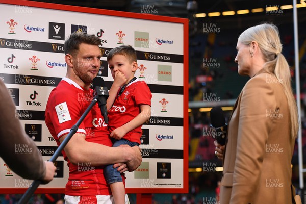 190322 - Wales v Italy - Guinness Six Nations - Dan Biggar of Wales and son James is interviewed by Sonja McLaughlan after the game