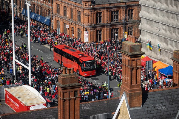 190322 - Wales v Italy - Guinness 6 Nations - Wales bus arrives to packed streets outside the Principality Stadium
