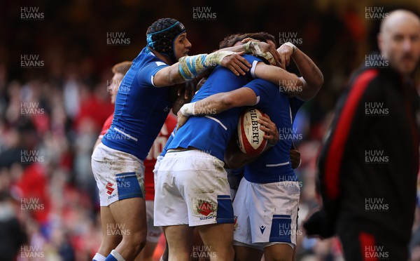 190322 - Wales v Italy - Guinness 6 Nations - Edoardo Padovani of Italy celebrates with team mates after scoring the match winning try