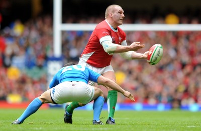 20.03.10 - Wales v Italy - RBS Six Nations 2010 - Gethin Jenkins of Wales is tackled by Tito Tebaldi of Italy. 