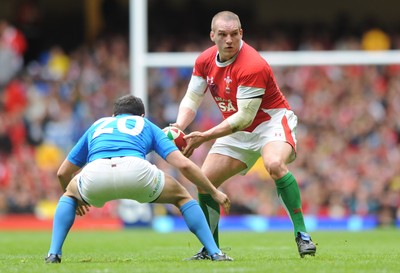 20.03.10 - Wales v Italy - RBS Six Nations 2010 - Gethin Jenkins of Wales is tackled by Tito Tebaldi of Italy. 