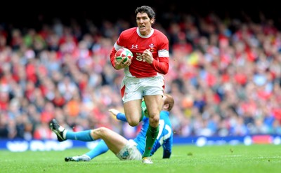 20.03.10 - Wales v Italy - RBS Six Nations 2010 - James Hook of Wales breaks away from Gonzalo Garcia of Italy. 