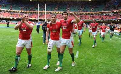20.03.10 - Wales v Italy - RBS Six Nations 2010 - Huw Bennett, Andrew Bishop and Mike Phillips of Wales celebrate win. 