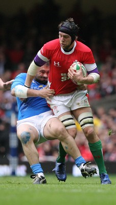 19.03.10 Wales v Italy... Wales Ryan Jones beats tackle by Italy's Martin Castrogiovanni. 