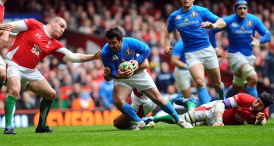 20.03.10 - Six Nations Rugby, Wales v Italy Italy's Craig Gower tries to get between Wales' Gethin Jenkins and Ryan Jones 