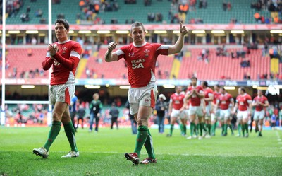 20.03.10 - Six Nations Rugby, Wales v Italy Wales' try scorers James Hook and Shane Williams show their appreciation to the fans at the end of the match 