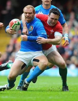 20.03.10 - Six Nations Rugby, Wales v Italy Italy's Gonzalo Garcia is tackled by Wales' Stephen Jones 