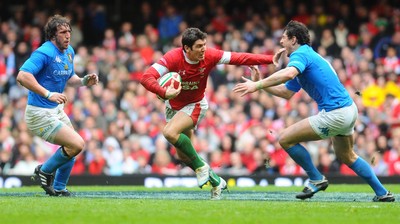 20.03.10 - Six Nations Rugby, Wales v Italy Wales' James Hook hands off Italy's Alessandro Zanni 