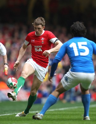 20.03.10 ... Wales v Italy, RBS 6 Nations 2010 -  Wales' Tom Prydie kicks past Italy's Luke McLean  