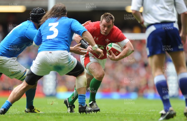 20.03.10 - Wales v Italy - RBS Six Nations 2010 - Matthew Rees of Wales is tackled by Martin Castrogiovanni of Italy. 