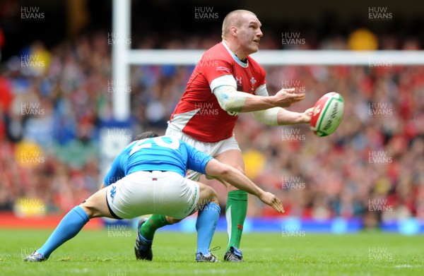 20.03.10 - Wales v Italy - RBS Six Nations 2010 - Gethin Jenkins of Wales is tackled by Tito Tebaldi of Italy. 