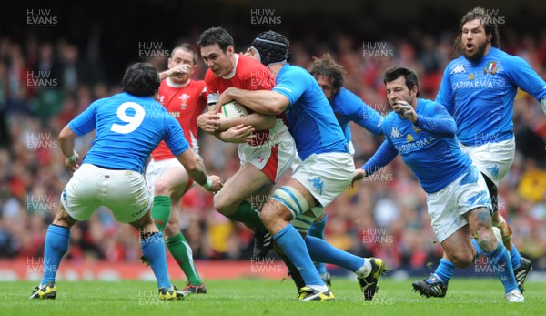20.03.10 - Wales v Italy - RBS Six Nations 2010 - Stephen Jones of Wales is tackled by Carlo Antonio Del Fava of Italy. 