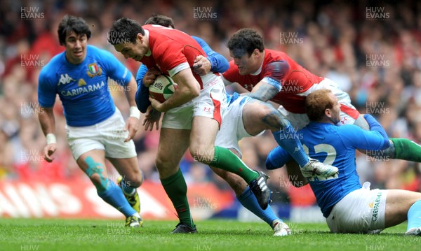 20.03.10 - Wales v Italy - RBS Six Nations 2010 - Stephen Jones of Wales is tackled by Craig Gower of Italy. 