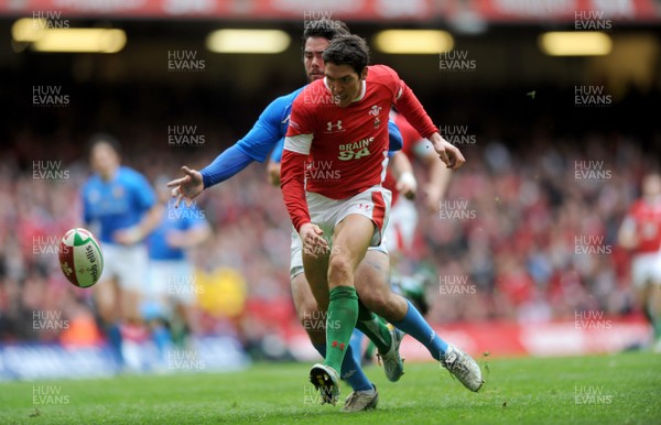 20.03.10 - Wales v Italy - RBS Six Nations 2010 - James Hook of Wales chases his kick. 