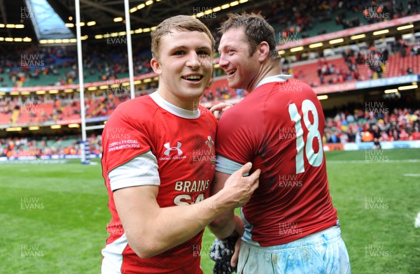 20.03.10 - Wales v Italy - RBS Six Nations 2010 - Tom Prydie who played his first game for Wales today aged 18 shows his age with the help of Ian Gough. 