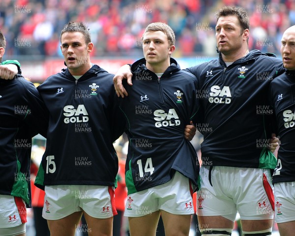 20.03.10 - Six Nations Rugby, Wales v Italy Wales' youngest ever cap Tom Prydie stands between Lee Byrne and Ian Gough as the anthems are sung 