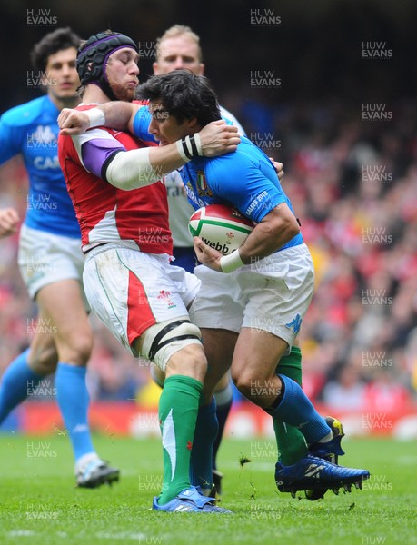20.03.10 - Six Nations Rugby, Wales v Italy Wales' Ryan Jones tackles Italy's Pablo Canavosio 