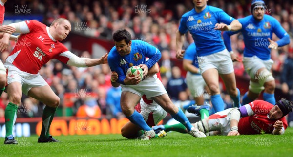 20.03.10 - Six Nations Rugby, Wales v Italy Italy's Craig Gower tries to get between Wales' Gethin Jenkins and Ryan Jones 