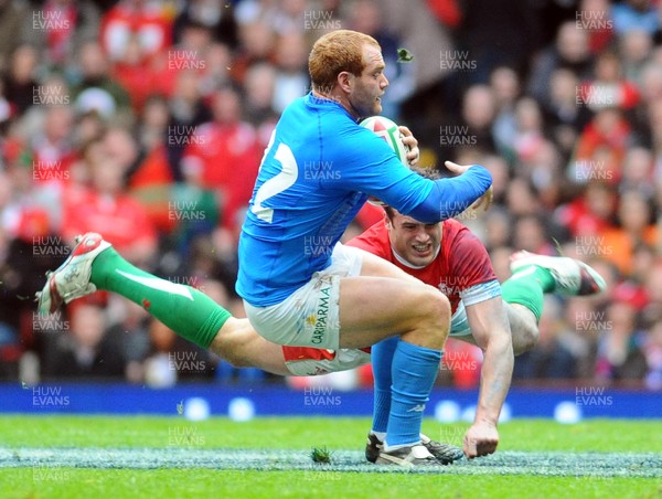 20.03.10 - Six Nations Rugby, Wales v Italy Italy's Gonzalo Garcia is challenged by Wales' Jamie Roberts 