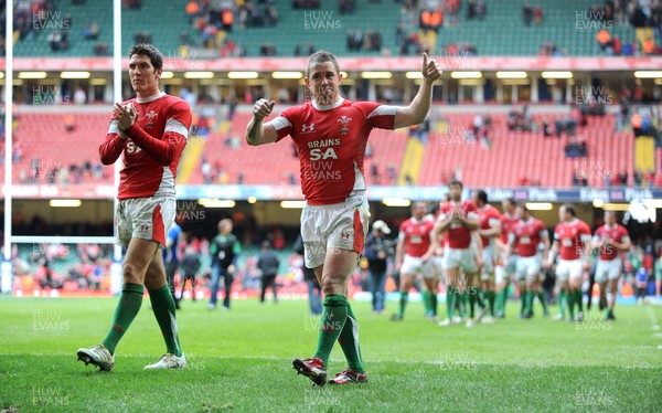 20.03.10 - Six Nations Rugby, Wales v Italy Wales' try scorers James Hook and Shane Williams show their appreciation to the fans at the end of the match 