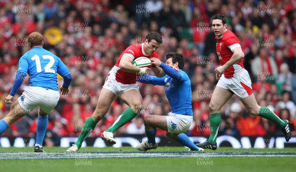 20.03.10 ... Wales v Italy, RBS 6 Nations 2010 -  Wales' Jamie Roberts is brought down 