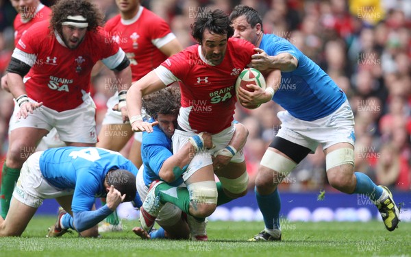 20.03.10 ... Wales v Italy, RBS 6 Nations 2010 -  Wales' Jonathan Thomas is brought down just short of the line 