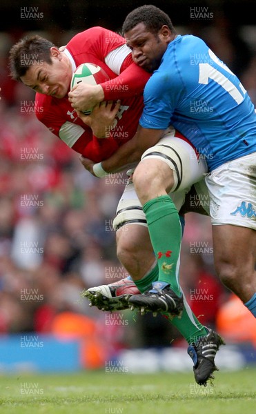 20.03.10 ... Wales v Italy, RBS 6 Nations 2010 -  Wales' Gareth Delve is tackled by Italy's Manoa Vosawai  