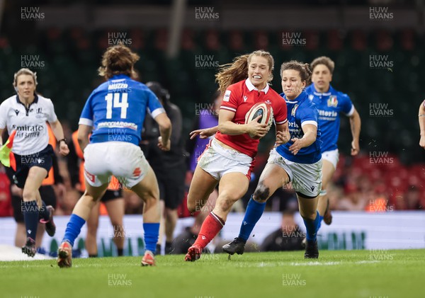 270424 - Wales v Italy, Guinness Women’s 6 Nations - Lisa Neumann of Wales takes on Aura Muzzo of Italy