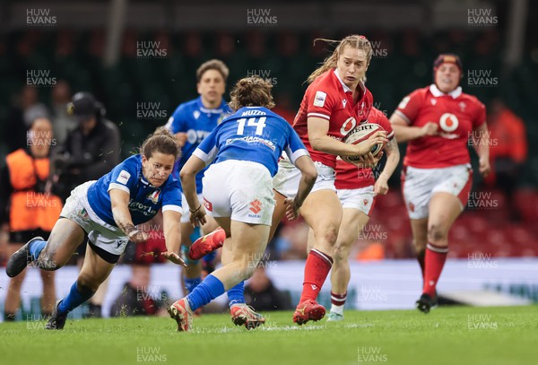 270424 - Wales v Italy, Guinness Women’s 6 Nations - Lisa Neumann of Wales takes on Aura Muzzo of Italy