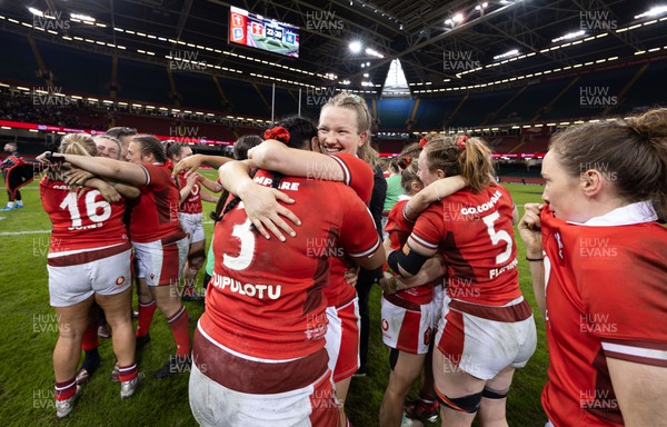 270424 - Wales v Italy, Guinness Women’s 6 Nations - Carys Cox of Wales celebrates with Sisilia Tuipulotu of Wales at the end of the match