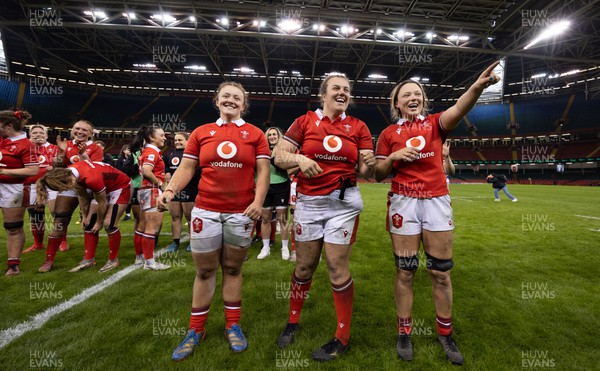 270424 - Wales v Italy, Guinness Women’s 6 Nations - Lleucu George of Wales, Carys Phillips of Wales and Alisha Butchers of Wales celebrate at the end of the match