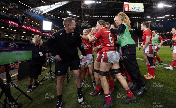 270424 - Wales v Italy, Guinness Women’s 6 Nations - Wales players ambush Ioan Cunningham, Wales Women head coach, during a TV interview  at the end of the match