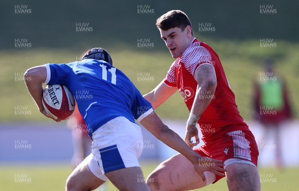 200322 - Wales U20s v Italy U20s - U20s 6 Nations Championship - Bryn Bradley of Wales can�t keep hold of Filippo Lazzarin of Italy