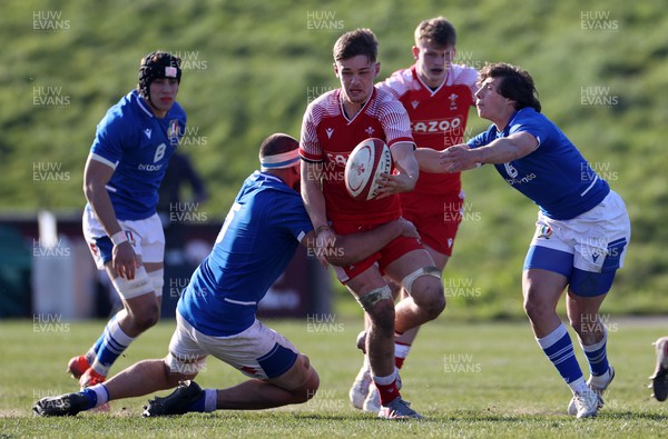 200322 - Wales U20s v Italy U20s - U20s 6 Nations Championship - Alex Mann of Wales is tackled by Riccardo Andreoli of Italy